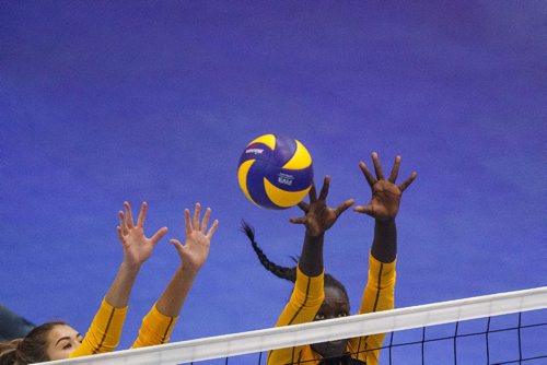 MIKE DEAL / WINNIPEG FREE PRESS
Team Manitoba women's volleyball team plays against Team PEI Wednesday afternoon at Investors Group Athletics Centre.
Manitoba' Tori Isfjord (8) and Ayiya Ottogo (2) leap to block a shot during game action.
170809 - Wednesday, August 09, 2017.