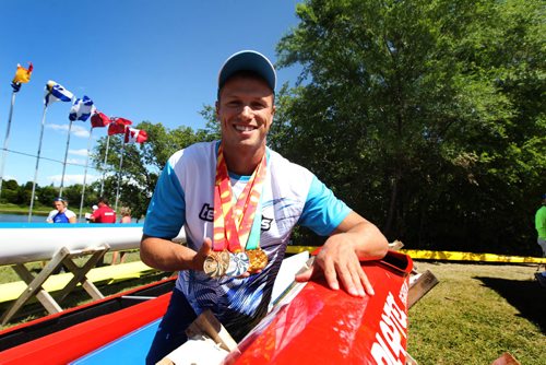 RUTH BONNEVILLE / WINNIPEG FREE PRESS

Zane Clarke of Nova Scotia but originally from Manitoba comes in 1st in the K-1 1000 metre kayak finals in the Canada Summer Games at the Manitoba Canoe and Kayak Centre Venue Tuesday.  
Clarke holds his medals next to his boat on the shore Thursday for photos. 
See Jason Bell story. 
Photo of him finishing his race on Tuesday in merlin.  
  
Aug 10,, 2017