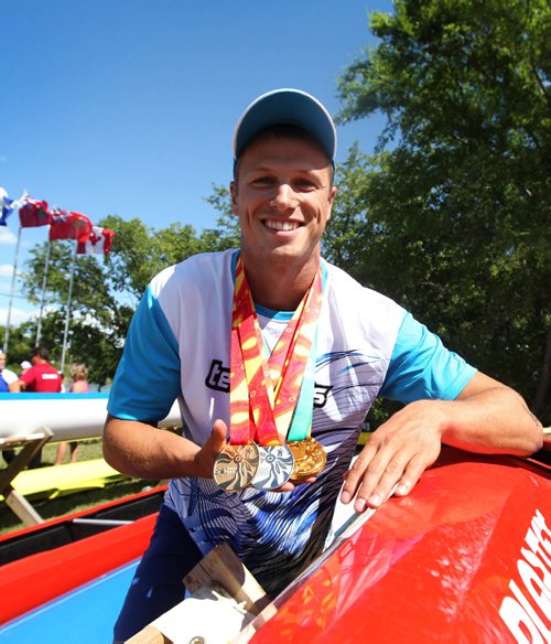 RUTH BONNEVILLE / WINNIPEG FREE PRESS

Zane Clarke of Nova Scotia but originally from Manitoba comes in 1st in the K-1 1000 metre kayak finals in the Canada Summer Games at the Manitoba Canoe and Kayak Centre Venue Tuesday.  
Clarke holds his medals next to his boat on the shore Thursday for photos. 
See Jason Bell story. 
Photo of him finishing his race on Tuesday in merlin.  
  
Aug 10,, 2017