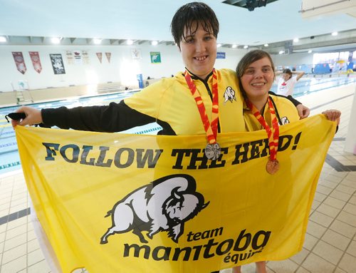 JOHN WOODS / WINNIPEG FREE PRESS
Canada Games Special O medalists, from left, MB's Quinlan Roberts and Samantha Currie get their medals in the 50m backstroke at Pan Am Pool Thursday, August 10, 2017.