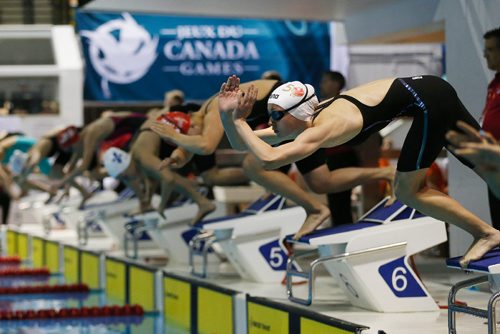 JOHN WOODS / WINNIPEG FREE PRESS
MB's Oksana takes off in the Canada Games 100m butterfly final at Pan Am Pool Thursday, August 10, 2017. 

