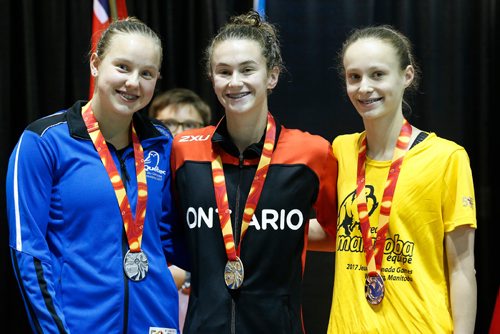 JOHN WOODS / WINNIPEG FREE PRESS
Canada Games medalists, from left, QC's Jeanne Dahmen, ON's Genevieve Sasseville and MB's Oksana Chaput get their medals in the 1000m butterfly at Pan Am Pool Thursday, August 10, 2017.