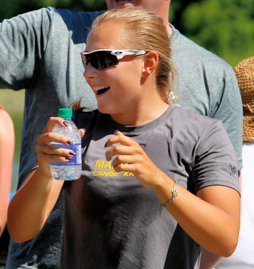 JUSTIN SAMANSKI-LANGILLE / WINNIPEG FREE PRESS
Team Manitoba's Nicole Boyle celebrates on the dock Friday after her and her teammates paddled to victory in the IC4 200m final at the Manitoba Canoe and Kayak Centre.
170811 - Friday, August 11, 2017.