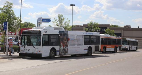 TREVOR HAGAN / WINNIPEG FREE PRESS 
Buses in the bus loop in the Unicity Mall parking lot, Friday, August 11, 2017.