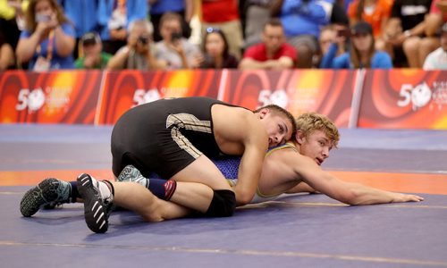 TREVOR HAGAN / WINNIPEG FREE PRESS
Carson Lee of Manitoba, on top of Adam Thomson of Alberta for gold mens 76 KG category. Lee would lose a close match, Friday, August 11, 2017.