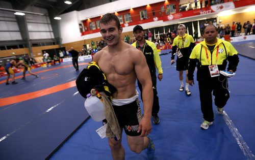 TREVOR HAGAN / WINNIPEG FREE PRESS
Hunter Lee of Manitoba, celebrating after defeating Kyle Jordon of Ontario for gold in the mens 98kg wrestling division, Friday, August 11, 2017.