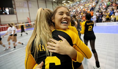 TREVOR HAGAN / WINNIPEG FREE PRESS
Team Manitoba's Anna Maidment (6) and Tori Isfjord (8) celebrate after defeating Alberta to win volleyball gold at the Canada Summer games, Saturday, August 12, 2017.