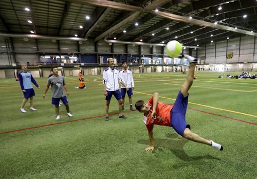 TREVOR HAGAN / WINNIPEG FREE PRESS
Isaac Simon and his NWT Soccer teammates kill time in the soccer complex while waiting for the rest of the Canada Summer Games athletes to converge before closing ceremonies at Investors Group Field, Sunday, August 13, 2017.