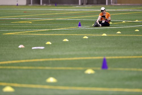 TREVOR HAGAN / WINNIPEG FREE PRESS
Volunteer, Terri Tremorin, kills time in the soccer complex while waiting for the Canada Summer Games athletes to converge before closing ceremonies at Investors Group Field, Sunday, August 13, 2017.