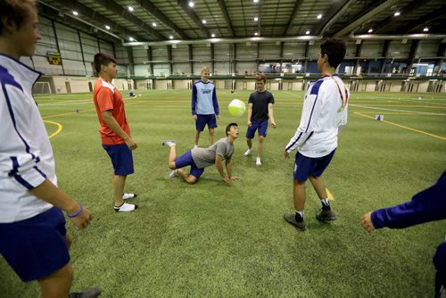 TREVOR HAGAN / WINNIPEG FREE PRESS
Hunter Lantz, middle, and his NWT Soccer teammates kill time in the soccer complex while waiting for the rest of the Canada Summer Games athletes to converge before closing ceremonies at Investors Group Field, Sunday, August 13, 2017.