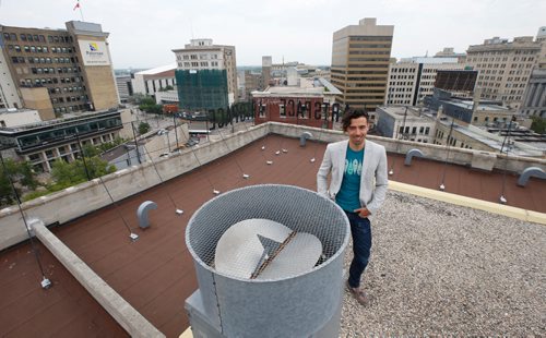 WAYNE GLOWACKI / WINNIPEG FREE PRESS
Borders Page. Eric Plamondon, GM of Artspace on the roof of the building overlooking the Exchange District. On Thursday August 24th, from 8pm until late they are inviting everyone to come to celebrate their 30th Anniversary! Get Lost in Artsp_ce. On the roof, visual artist Pat Lazo will be creating a rooftop mural. August 15 2017