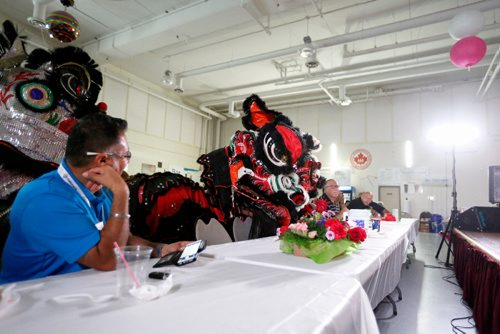JUSTIN SAMANSKI-LANGILLE / WINNIPEG FREE PRESS
Artists get up close and personal with spectators as they perform a traditional Lion Dance Wednesday at the Indochina Chinese Folklorama Pavillion.
170816 - Wednesday, August 16, 2017.