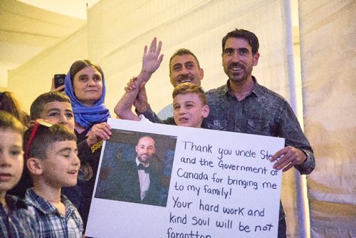 JUSTIN SAMANSKI-LANGILLE / WINNIPEG FREE PRESS
Emad Mishko Tamo, 12, centre, his mother Nofa Mihlo Rafo, left, and uncle Hadji Tamo walk out of a private room in Winnipeg's James Armstrong Richardson International Airport Thursday after Emad was freed from ISIS captivity and returned to his family in Winnipeg.
170817 - Thursday, August 17, 2017.