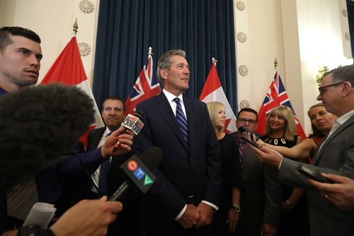 RUTH / BONNEVILLE WINNIPEG FREE PRESS

Manitoba Premier Brian Pallister answers questions from the media after cabinet shuffle where he announced  changes to Executive Council and new ministers were sworn in at the Manitoba Legislature Thursday. 

Aug 13, 2017
