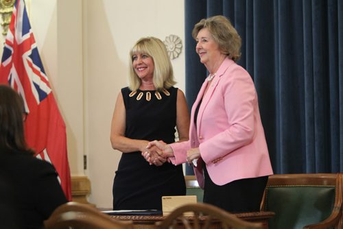 RUTH / BONNEVILLE WINNIPEG FREE PRESS

Cathy Cox  (MLA for River Easti) shakes Lieutenant Governor Janice Filmon's hand after being sworn into cabinet as the new minister of sport, culture and heritage during Premier Brian Pallister's  cabinet shuffle  announced  at the Manitoba Legislature Thursday. 

Aug 17, 2017
