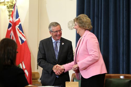 RUTH / BONNEVILLE WINNIPEG FREE PRESS
Blaine Pedersen shakes Lieutenant Governor Janice Filmon's hand after being sworn into cabinet as the new - minister of growth, enterprise and trade. during Premier Brian Pallister's cabinet shuffle announced at the Manitoba Legislature Thursday.
Aug 17, 2017