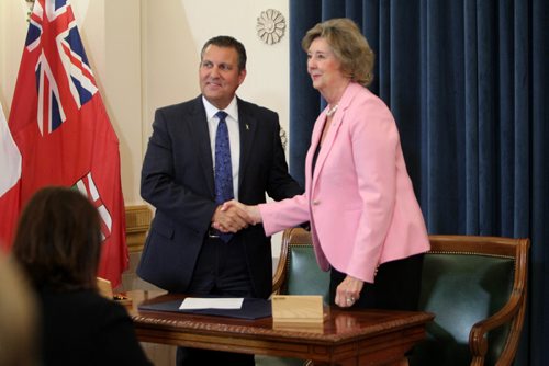 
RUTH / BONNEVILLE WINNIPEG FREE PRESS

Cliff Cullen  shakes Lieutenant Governor Janice Filmon's hand after being sworn into cabinet as the new - minister of Crown services and government house leader during Premier Brian Pallister's  cabinet shuffle  announced  at the Manitoba Legislature Thursday. 

Aug 17, 2017

