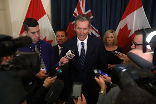 RUTH / BONNEVILLE WINNIPEG FREE PRESS

Manitoba Premier Brian Pallister answers questions from the media after cabinet shuffle where he announced  changes to Executive Council and new ministers were sworn in at the Manitoba Legislature Thursday. 

Aug 17, 2017
