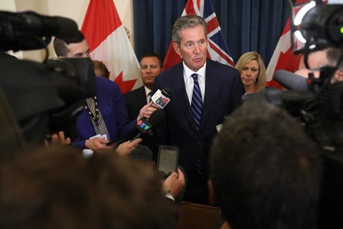 RUTH / BONNEVILLE WINNIPEG FREE PRESS

Manitoba Premier Brian Pallister answers questions from the media after cabinet shuffle where he announced  changes to Executive Council and new ministers were sworn in at the Manitoba Legislature Thursday. 

Aug 17, 2017
