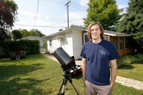 JUSTIN SAMANSKI-LANGILLE / WINNIPEG FREE PRESS
Brenden Petracek, president of the Winnipeg chapter of the Royal Astronomical Society of Canada poses with one of his telescopes Thursday. 
170817 - Thursday, August 17, 2017.