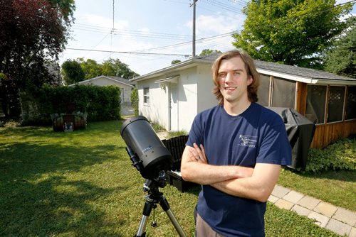 JUSTIN SAMANSKI-LANGILLE / WINNIPEG FREE PRESS
Brenden Petracek, president of the Winnipeg chapter of the Royal Astronomical Society of Canada poses with one of his telescopes Thursday. 
170817 - Thursday, August 17, 2017.