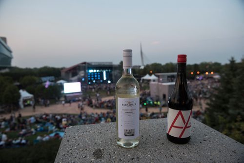 DAVID LIPNOWSKI / WINNIPEG FREE PRESS

Winnipeg Free Press Jen Zoratti and Jill Wilson enjoy wine pairings at Interstellar Rodeo at The Forks Saturday August 19, 2017.