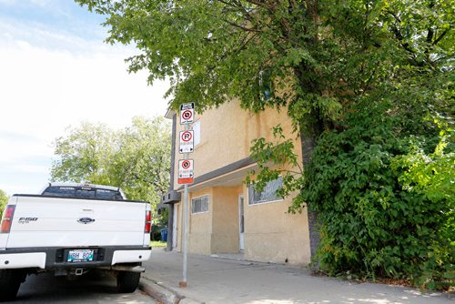 JUSTIN SAMANSKI-LANGILLE / WINNIPEG FREE PRESS
The front of a Selkirk Avenue building is seen Sunday after a suit in the building was shot at earlier. The young family living in the suit was not hurt in the incident. 
170820 - Sunday, August 20, 2017.