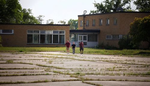 PHIL HOSSACK / WINNIPEG FREE PRESS  - Three veterans  formerly based at Kapyong Barracks walk away from a last look at the former Officer's Mess, soon to be demolished along with the rest of the former Military base. See Melissa Martin story. - August 21, 2017