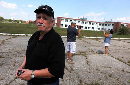 PHIL HOSSACK / WINNIPEG FREE PRESS  - Joe Reidy served with 2PPCLI/3RCR/and 17Wing all at Kapyong, he walked out on the parade ground with the old HQ building behind him to take some photos. .    About 25 vets came "home" for a last look at the soon to be demolished former Military base. None of the vets were allowed into the bases buildings. See Melissa Martin story. - August 21, 2017