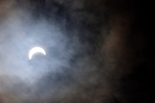 WAYNE GLOWACKI / WINNIPEG FREE PRESS

The gathering outside the Manitoba Museum got glimpses of¤the partial eclipse through the clouds¤Monday. Keila DePape story  August 21 2017