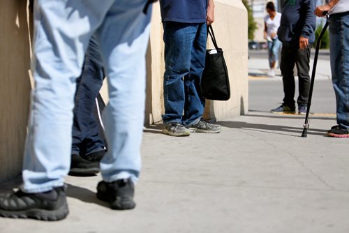 JUSTIN SAMANSKI-LANGILLE / WINNIPEG FREE PRESS
People line up in front of the Siloam Mission Tuesday for the lunchtime meal service.
170822 - Tuesday, August 22, 2017.