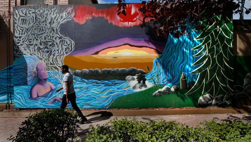 WAYNE GLOWACKI / WINNIPEG FREE PRESS

The mural titled O Kanata on the side of Y-Not Foods at 501 Ellice Ave. at Spence St. by artists Annie Beach and Brianna Wentz. The mural created  to honour Canada on its 150th anniversary of Confederation was unveiled Tuesday morning.  August 22 2017
