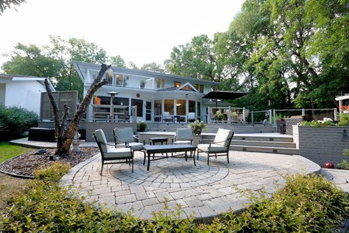 JUSTIN SAMANSKI-LANGILLE / WINNIPEG FREE PRESS
The large back patio of 59 Salme offers plenty of spaces for dining and entertaining while enjoying views of the massive yard which reaches all the way to the river. 
170822 - Tuesday, August 22, 2017.