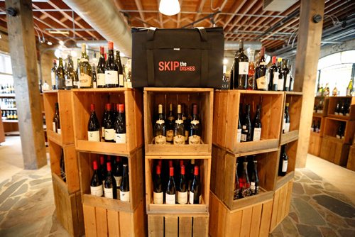JUSTIN SAMANSKI-LANGILLE / WINNIPEG FREE PRESS
A Skip the Dishes delivery bag is seen inside Elements Fine Wines Tuesday. The food delivery service will begin delivering wine, beer and spirits to customer's doors alongside the current food offerings.
170822 - Tuesday, August 22, 2017.
