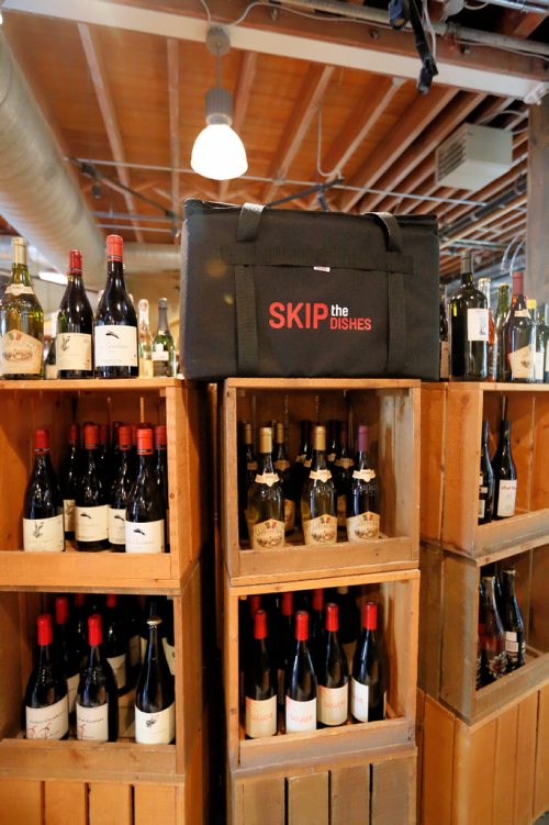 JUSTIN SAMANSKI-LANGILLE / WINNIPEG FREE PRESS
A Skip the Dishes delivery bag is seen inside Elements Fine Wines Tuesday. The food delivery service will begin delivering wine, beer and spirits to customer's doors alongside the current food offerings.
170822 - Tuesday, August 22, 2017.