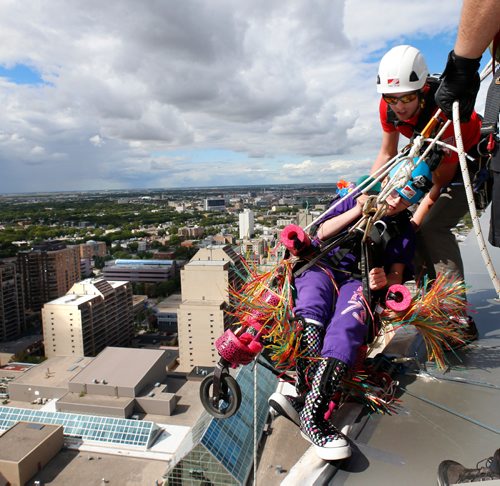 WAYNE GLOWACKI / WINNIPEG FREE PRESS

Allie Onslow,18, with Team Unstoppable gets prepared to go over the ledge of the Manitoba Hydro Building on Portage Ave. Tuesday. With the assistance of Nelson Seniuk,  she was one of the 66 people taking part in the  13th Annual Easter Seals Drop Zone.  The event is in support of SMD Foundation/Easter Seals Manitoba, their goal is to raise $170,000. Intern Keila storyAugust 22 2017
