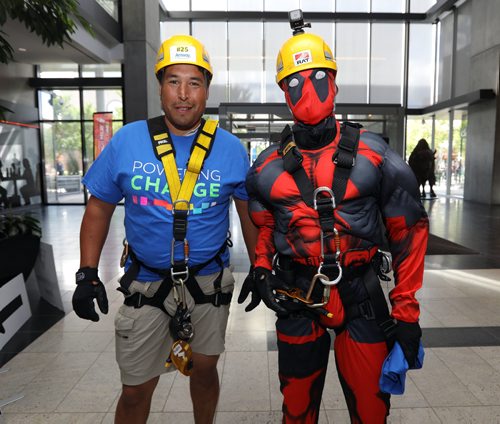 JASON HALSTEAD / WINNIPEG FREE PRESS

L-R: Participants George Sinclair and Pawel Jackowski (both Manitoba Hydro employees) prepare for their turn at the 13th annual Easter Seals Drop Zone in support of children, youth and adults with disabilities in Manitoba at the Manitoba Hydro Building in Downtown Winnipeg on Aug. 22, 2017. (See Social Page)
