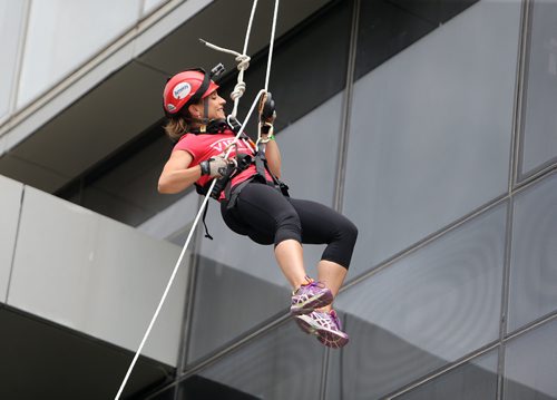 JASON HALSTEAD / WINNIPEG FREE PRESS

CBC Winnipeg employee Sabrina Carnevale takes her turn at the 13th annual Easter Seals Drop Zone in support of children, youth and adults with disabilities in Manitoba at the Manitoba Hydro Building in Downtown Winnipeg on Aug. 22, 2017. (See Social Page)