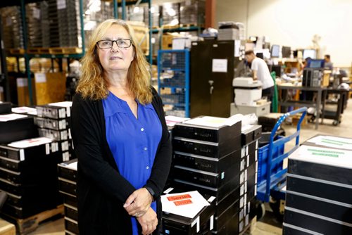 JUSTIN SAMANSKI-LANGILLE / WINNIPEG FREE PRESS
Karen Kerr, executive director of Computers for Kids Manitoba poses in the organization's workshop Wednesday. Computers for Kids provides refurbished computers for schools and low income families. 
170823 - Wednesday, August 23, 2017.