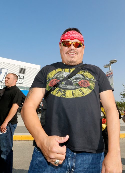 JUSTIN SAMANSKI-LANGILLE / WINNIPEG FREE PRESS
Vernon Shebagabow from Thunderbay poses in front of Investors Group Filed Thursday as he waits to get in for the Guns N' Roses concert.
170824 - Thursday, August 24, 2017.