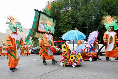 JUSTIN SAMANSKI-LANGILLE / WINNIPEG FREE PRESS
Members of the Winnipeg Filipino community participate in this year's Filipino Street Festival parade on Saturday.
170826 - Saturday, August 26, 2017.