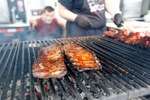 JUSTIN SAMANSKI-LANGILLE / WINNIPEG FREE PRESS
Some mouthwatering ribs sit on the grill Saturday during this year's Winnipeg Ribfest at The Forks.
170826 - Saturday, August 26, 2017.