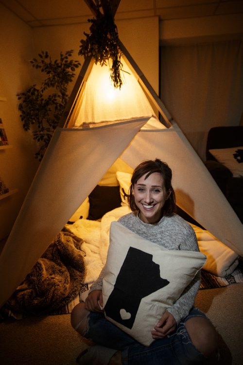 MIKE DEAL / WINNIPEG FREE PRESS
Jennifer Robins owner of the homebased Kate & Norah Co. sit's beside a lavvu (that's pronounced la-VOO). The lavvu is a Scandinavian-style tent and were originally used by deer herders in the high Arctic. Hers are geared more towards children and are generally used as play areas at home, in the backyard or on the beach. 
170828 - Monday, August 28, 2017.