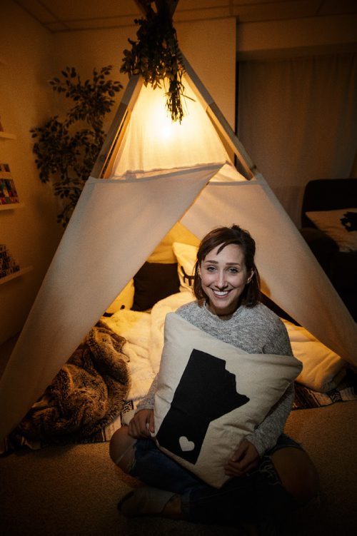 MIKE DEAL / WINNIPEG FREE PRESS
Jennifer Robins owner of the homebased Kate & Norah Co. sit's beside a lavvu (that's pronounced la-VOO). The lavvu is a Scandinavian-style tent and were originally used by deer herders in the high Arctic. Hers are geared more towards children and are generally used as play areas at home, in the backyard or on the beach. 
170828 - Monday, August 28, 2017.