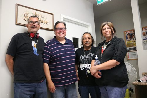 Canstar Community News Aug. 21, 2017 - Kyle Mason (second from left) with regular North End Family Centre members Chris Stunick (far left), Charles Halpin (second right) and Cheryl Houle (far right). (Ligia Braidotti/Canstar Community News/The Times)