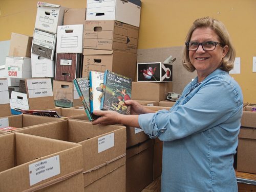 Canstar Community News Gail Kushnier has been volunteering with the Children's Hospital Book Sale for 25 years. The annual fundraising event takes place this year from Sept. 28 to 30. (SHELDON BIRNIE/CANSTAR/THE HERALD)