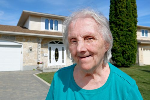 JUSTIN SAMANSKI-LANGILLE / WINNIPEG FREE PRESS
Frances Gorber poses outside her home Monday. Gorber says the city damaged her driveway clearing snow and now refuses to pay for repairs.
170828 - Monday, August 28, 2017.