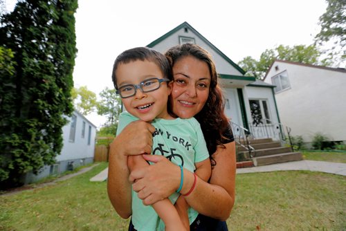 JUSTIN SAMANSKI-LANGILLE / WINNIPEG FREE PRESS
Marina Havard and her son Jayden, who has autism, pose outside their home Monday. Harvard is questioning the teacher's union's opposition to providing an educational assistant for Jayden's nursery class.
170828 - Monday, August 28, 2017.
