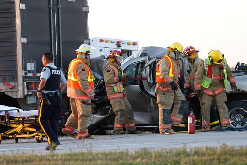JOHN WOODS / WINNIPEG FREE PRESS
Emergency crews work to extricate the driver in an MVC at the intersection of highway 1 and 248 at Elie Monday, August 28, 2017.