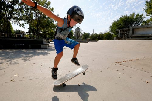 JUSTIN SAMANSKI-LANGILLE / WINNIPEG FREE PRESS
Ryland Orvis, 8, practices some skateboard tricks Tuesday afternoon at The Forks skatepark.
170829 - Tuesday, August 29, 2017.